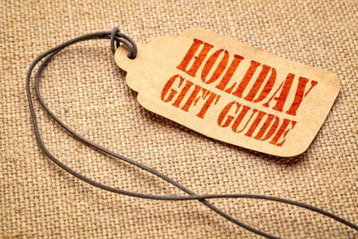 Holiday gift guide tag on burlap fabric, festive shopping and gift ideas concept