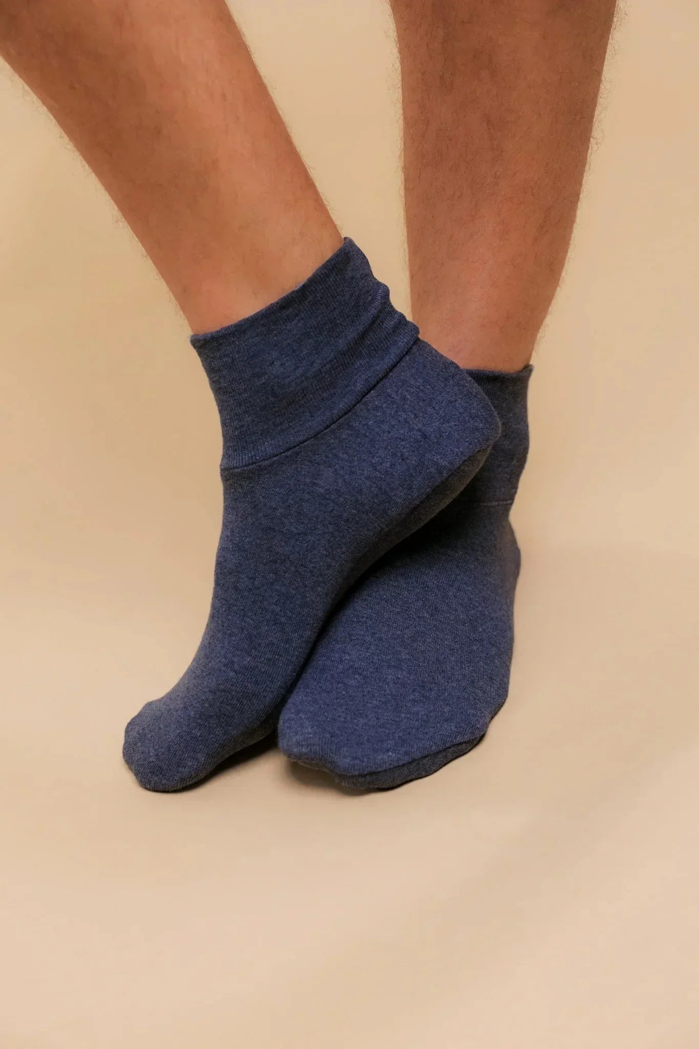 Blue hypoallergenic cotton ankle socks on feet, Cottonique allergy-free apparel