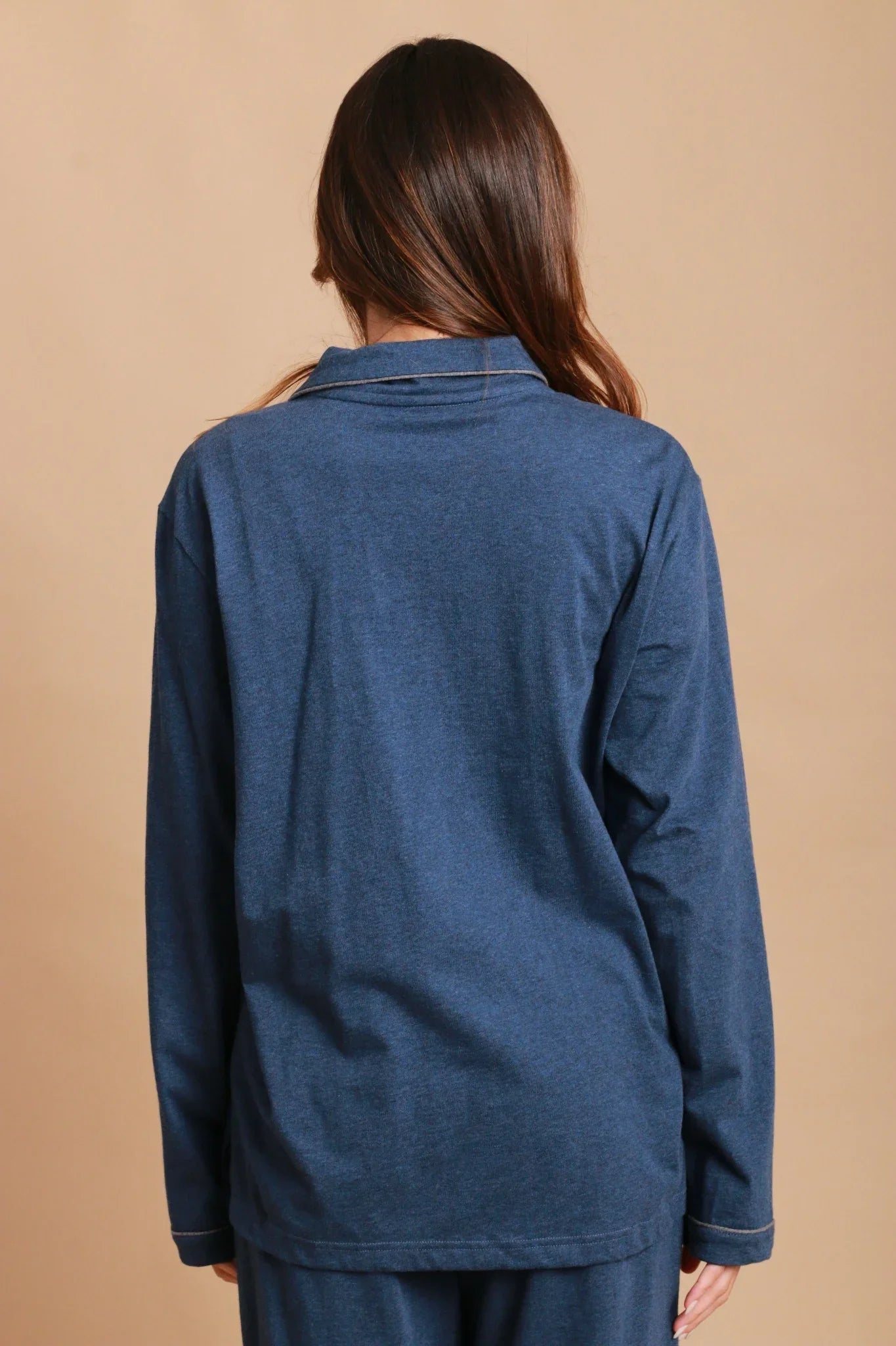 Woman modeling allergy-free blue cotton long sleeve top and pants from Cottonique
