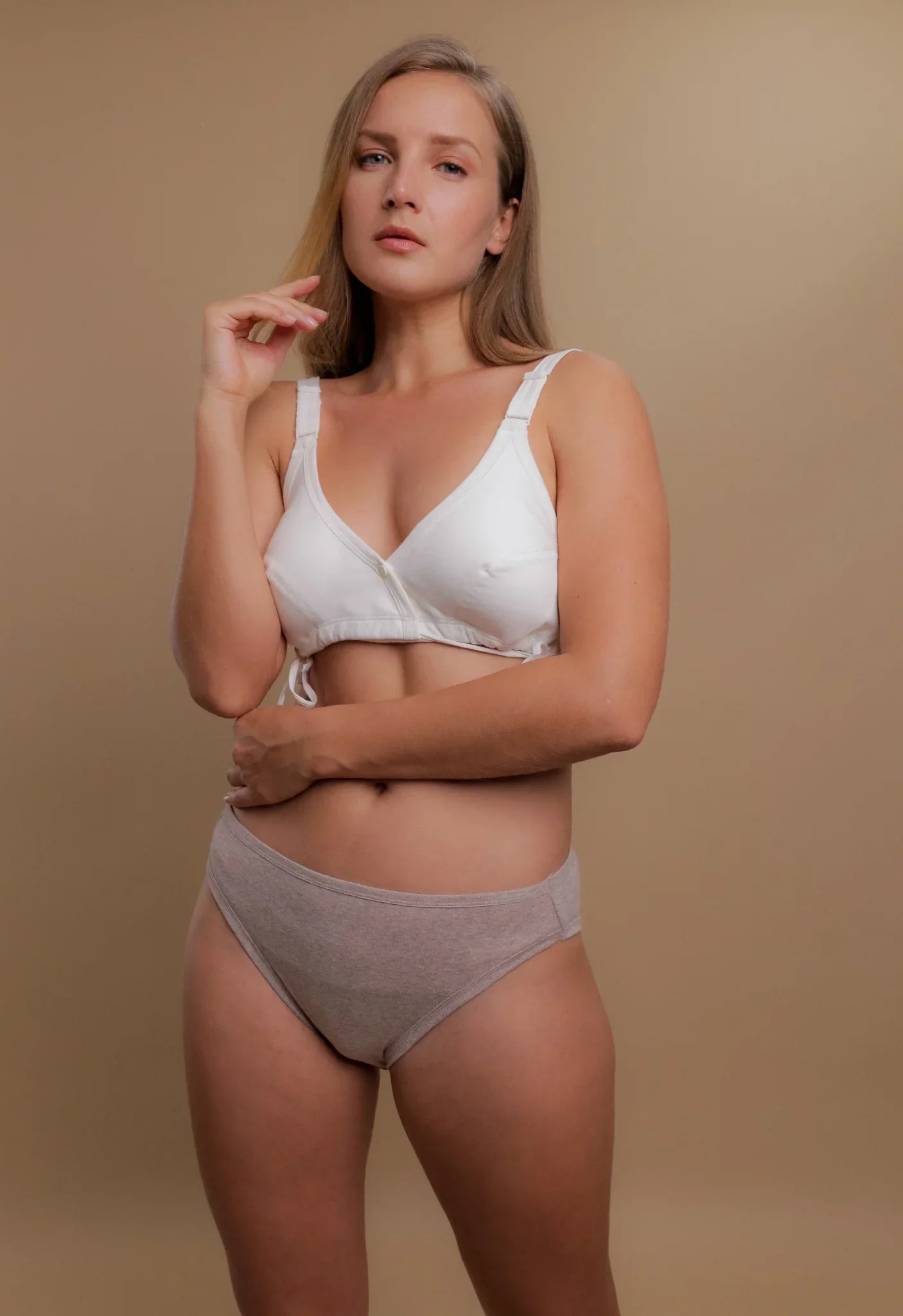 Woman wearing allergy-friendly organic cotton bra and panties for sensitive skin
