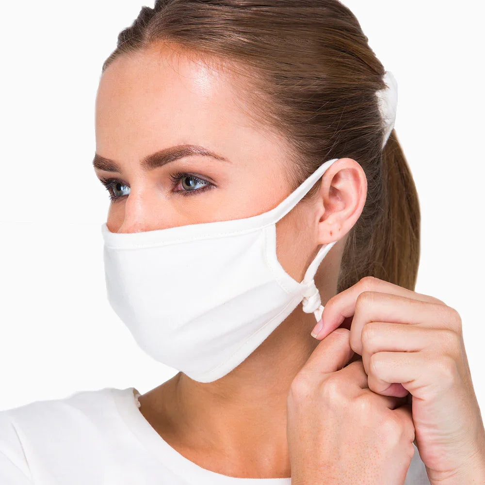 Woman wearing a natural hypoallergenic cotton face mask by Cottonique
